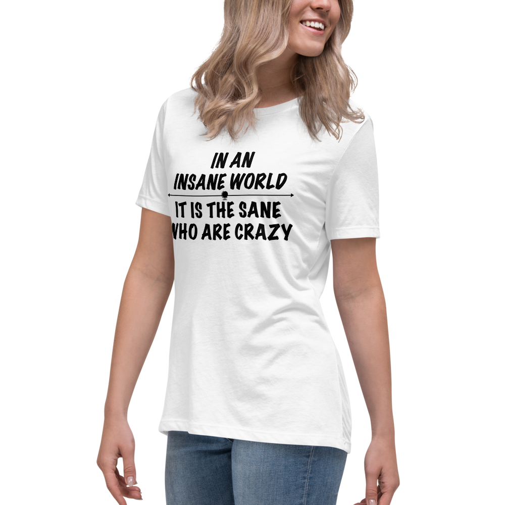 "In an insane world, it is the sane who are crazy" printed on a white women's relaxed t-shirt worn by a female