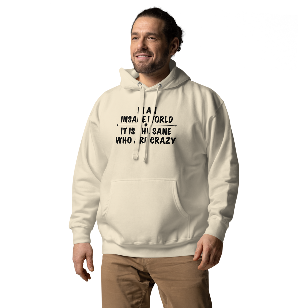 "In an insane world, it is the sane who are crazy" printed on a bone unisex hoodie worn by a male