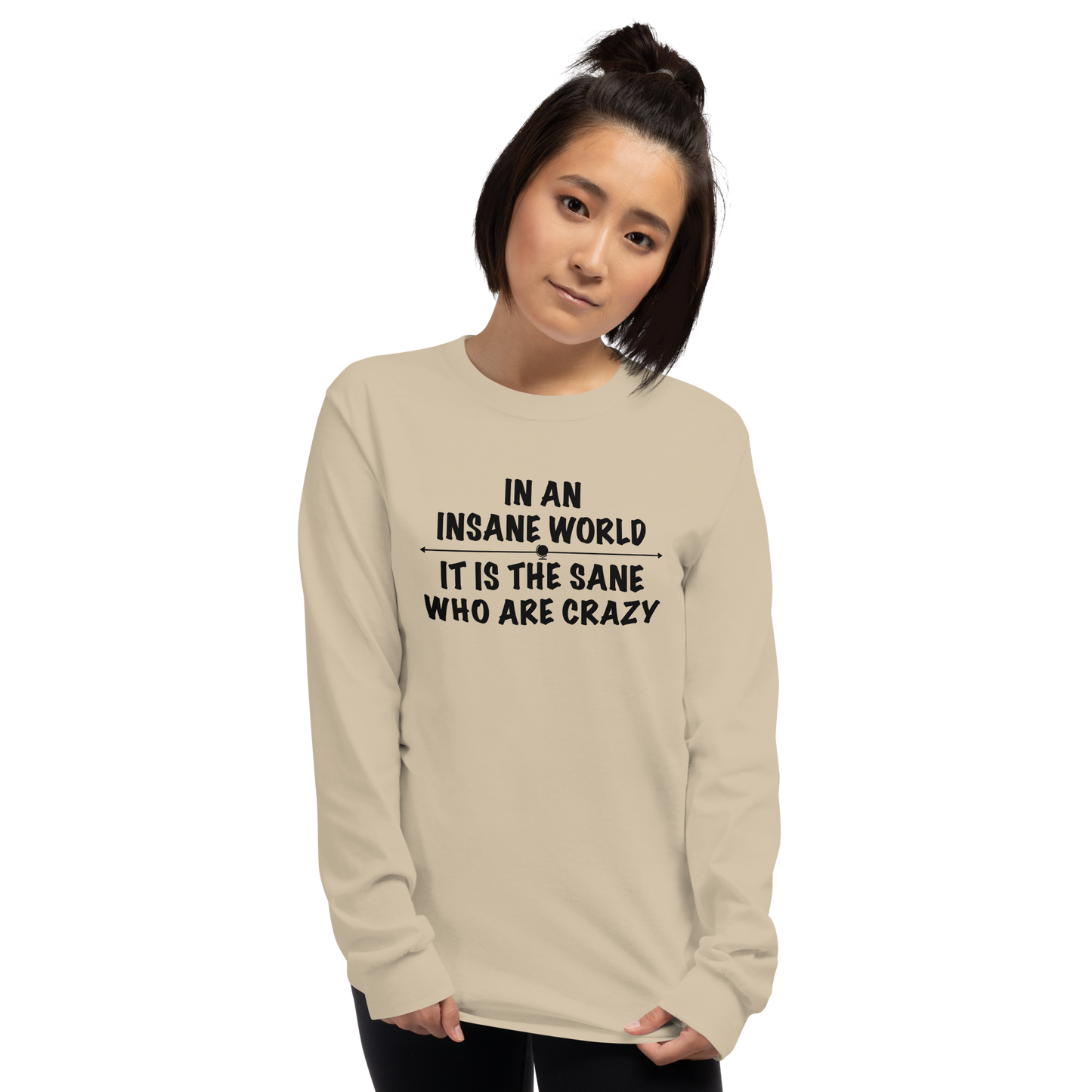 "In an insane world, it is the sane who are crazy" printed on a sand men's long sleeve shirt worn by a female