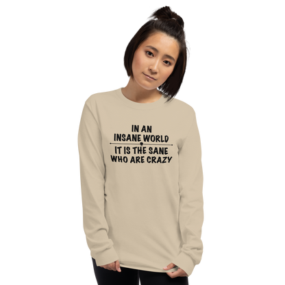 "In an insane world, it is the sane who are crazy" printed on a sand men's long sleeve shirt worn by a female