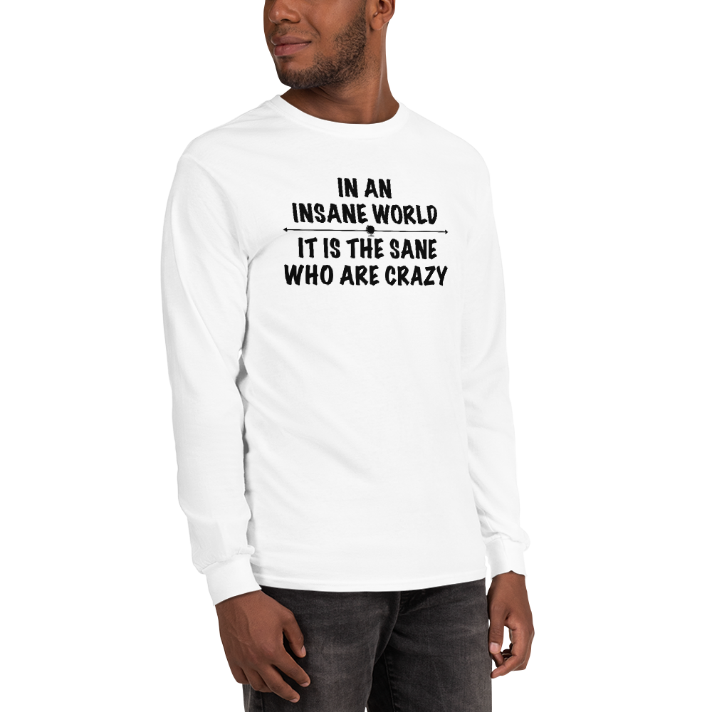 "In an insane world, it is the sane who are crazy" printed on a white men's long sleeve shirt worn by a male