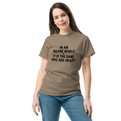 "In an insane world, it is the sane who are crazy" printed on a brown savana unisex classic tee worn by a female