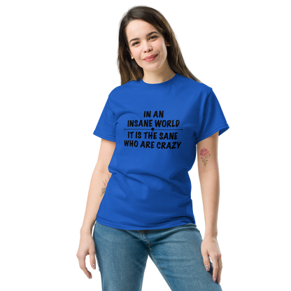 "In an insane world, it is the sane who are crazy" printed on a royal unisex classic tee worn by a female