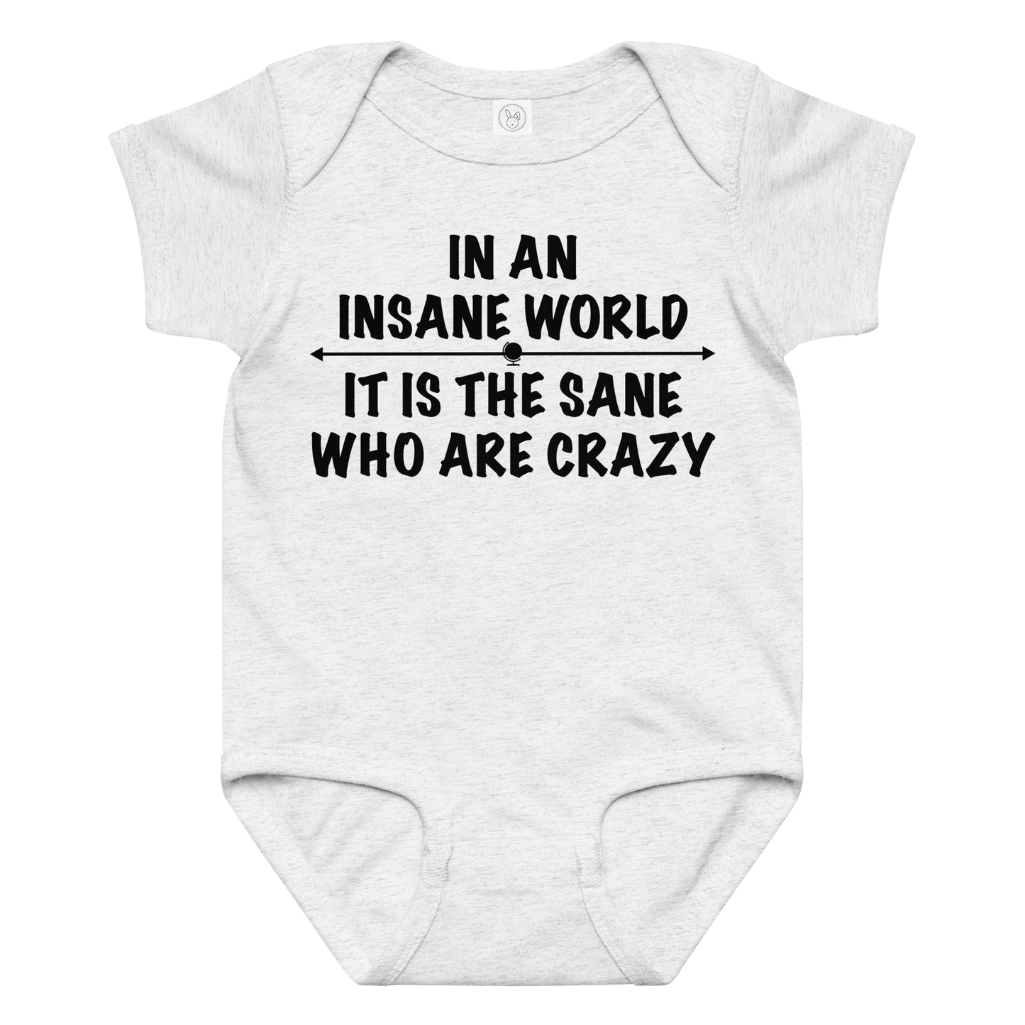 "In an insane world, it is the sane who are crazy" printed on a ash baby jersey bodysuit laying on a flat surface amongst other clothes