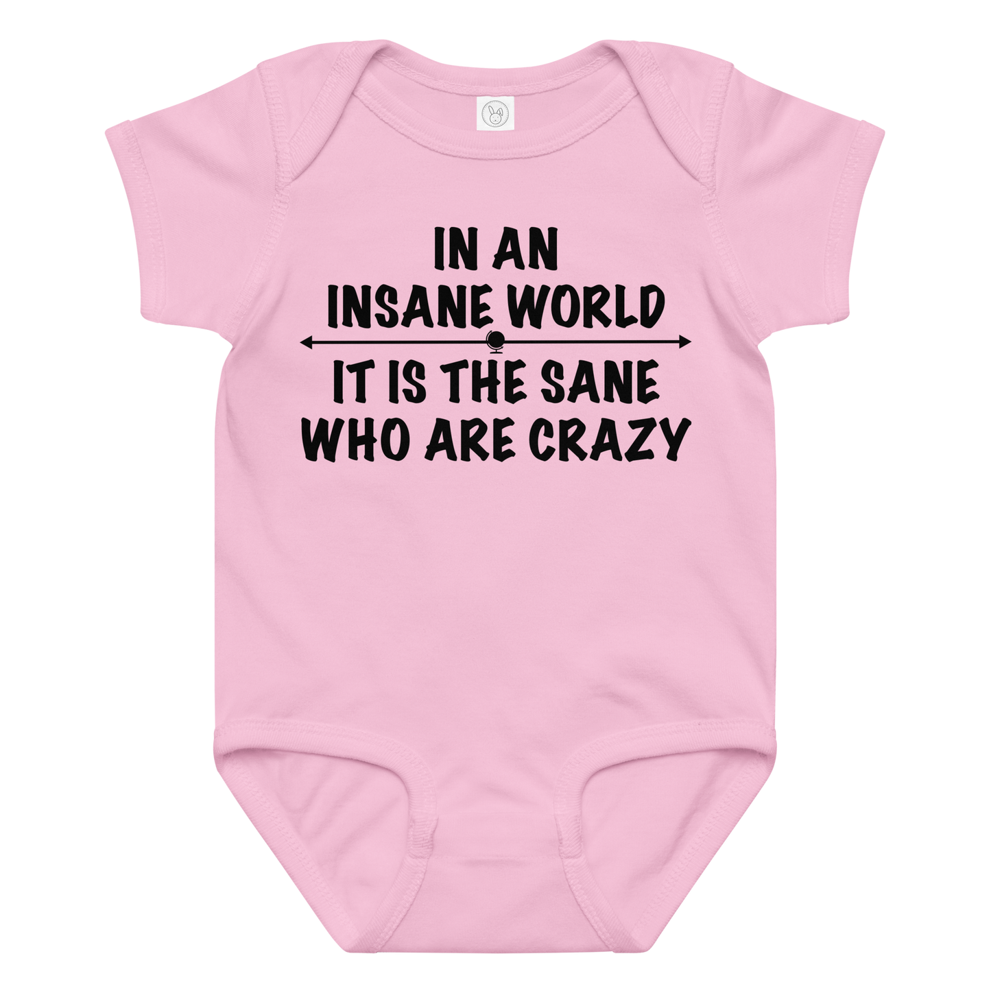 "In an insane world, it is the sane who are crazy" printed on a pink baby jersey bodysuit laying on a flat surface amongst other clothes