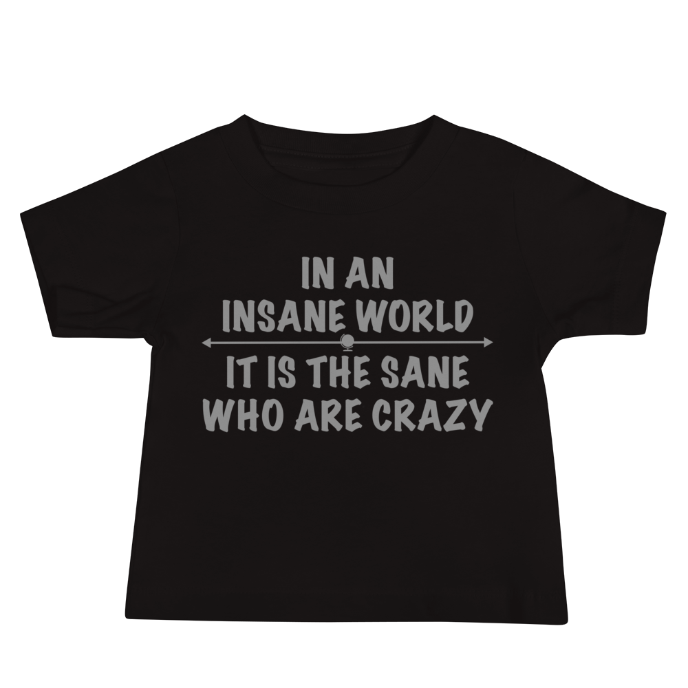 "In an insane world, it is the sane who are crazy" printed on a black baby jersey short sleeve tee laying on a flat surface