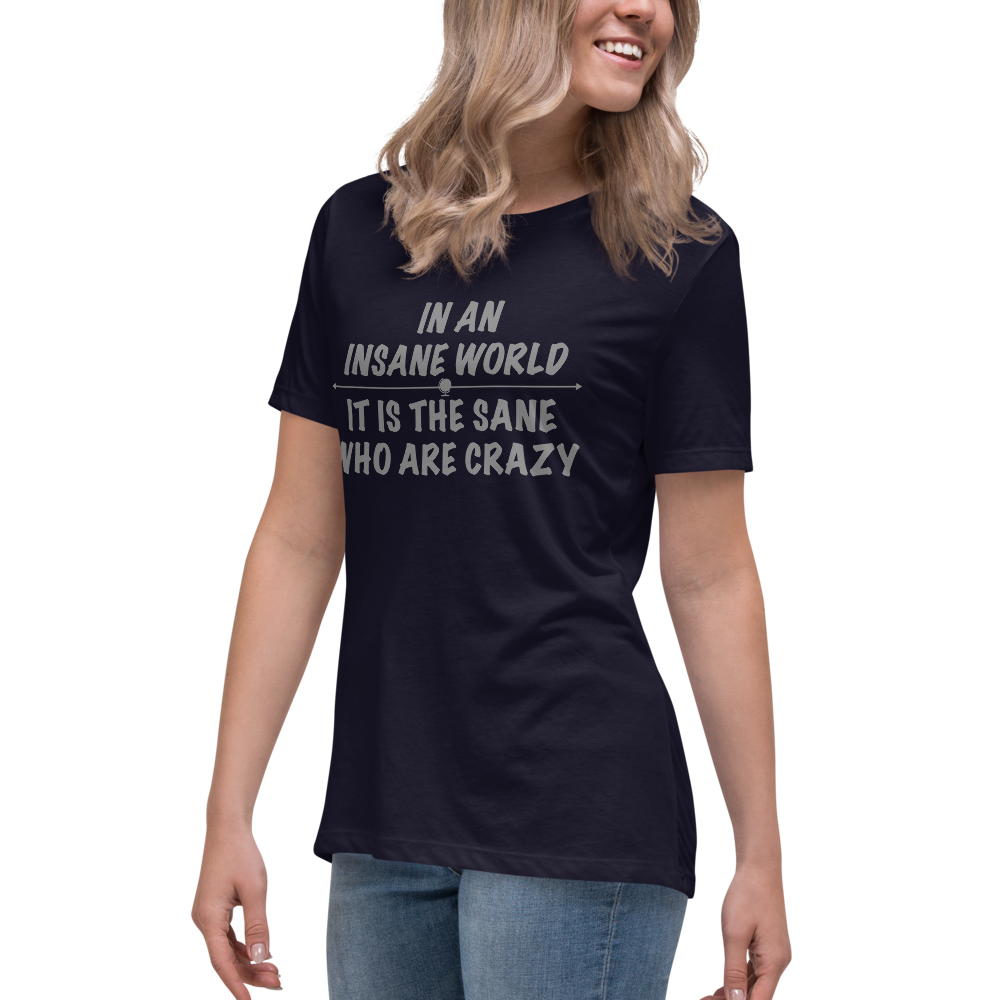 "In an insane world, it is the sane who are crazy" printed on a navy women's relaxed t-shirt worn by a female