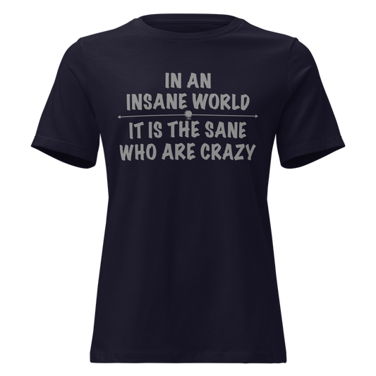 "In an insane world, it is the sane who are crazy" printed on a navy on an invisible / simulated body