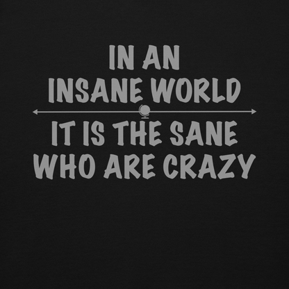 "In an insane world, it is the sane who are crazy" printed on a black background