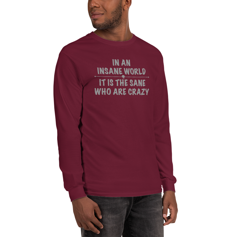 "In an insane world, it is the sane who are crazy" printed on a maroon men's long sleeve shirt worn by a male