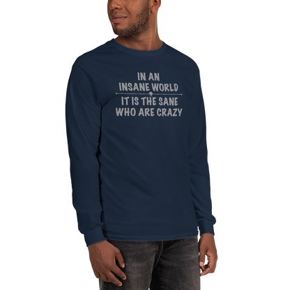 "In an insane world, it is the sane who are crazy" printed on a navy men's long sleeve shirt worn by a male