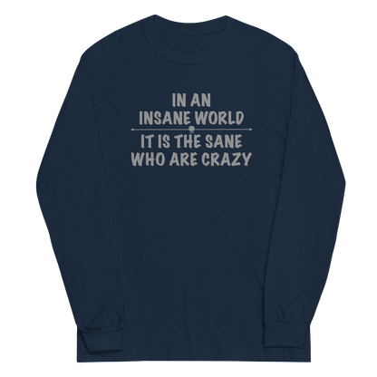 "In an insane world, it is the sane who are crazy" printed on a navy men's long sleeve shirt laying on a flat surface