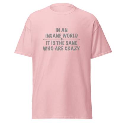 "In an insane world, it is the sane who are crazy" printed on a light pink on an invisible body