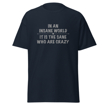 "In an insane world, it is the sane who are crazy" printed on a navy on an invisible body