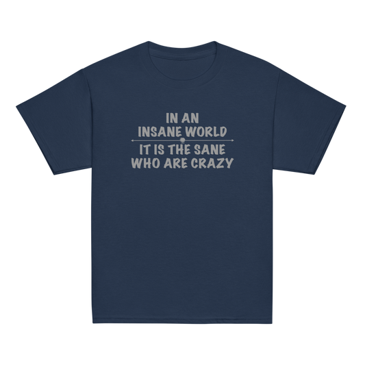 "In an insane world, it is the sane who are crazy" printed on a navy youth classic tee laying on a flat surface