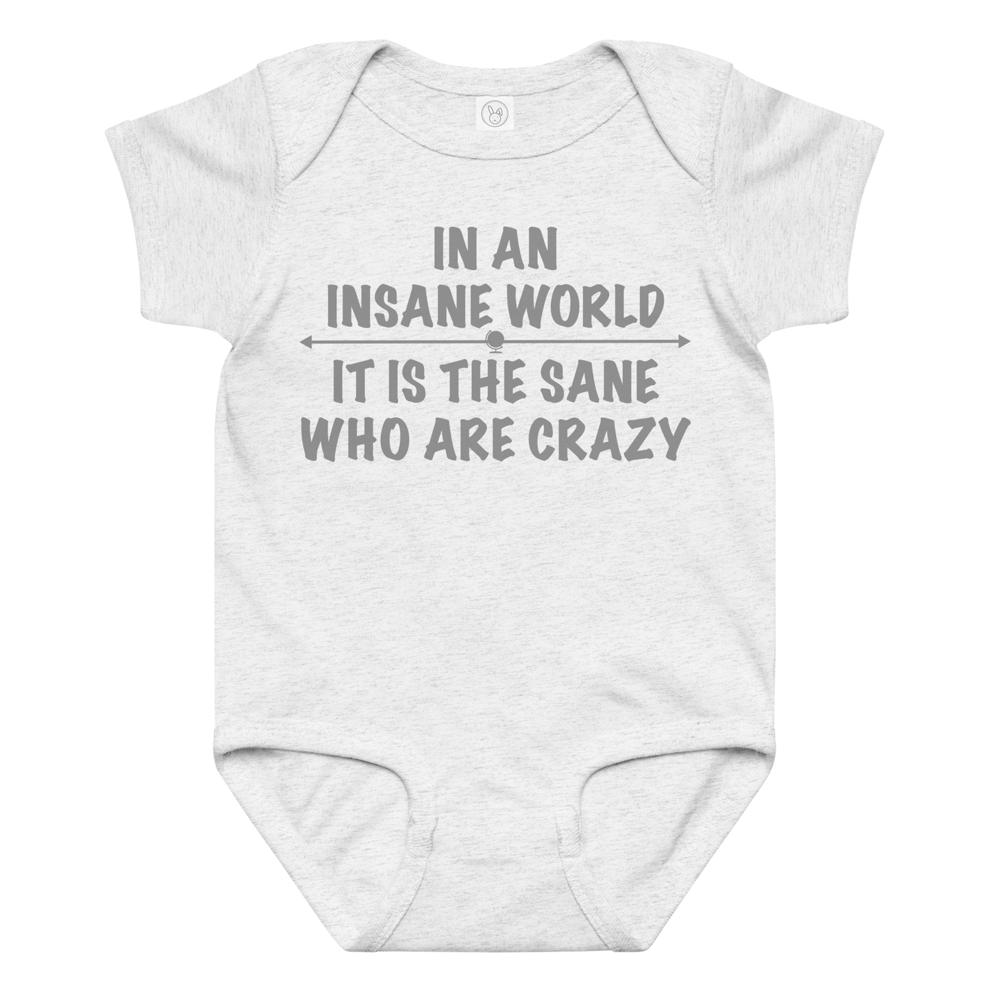 "In an insane world, it is the sane who are crazy" printed on a ash baby jersey bodysuit laying on a flat surface amongst other clothes