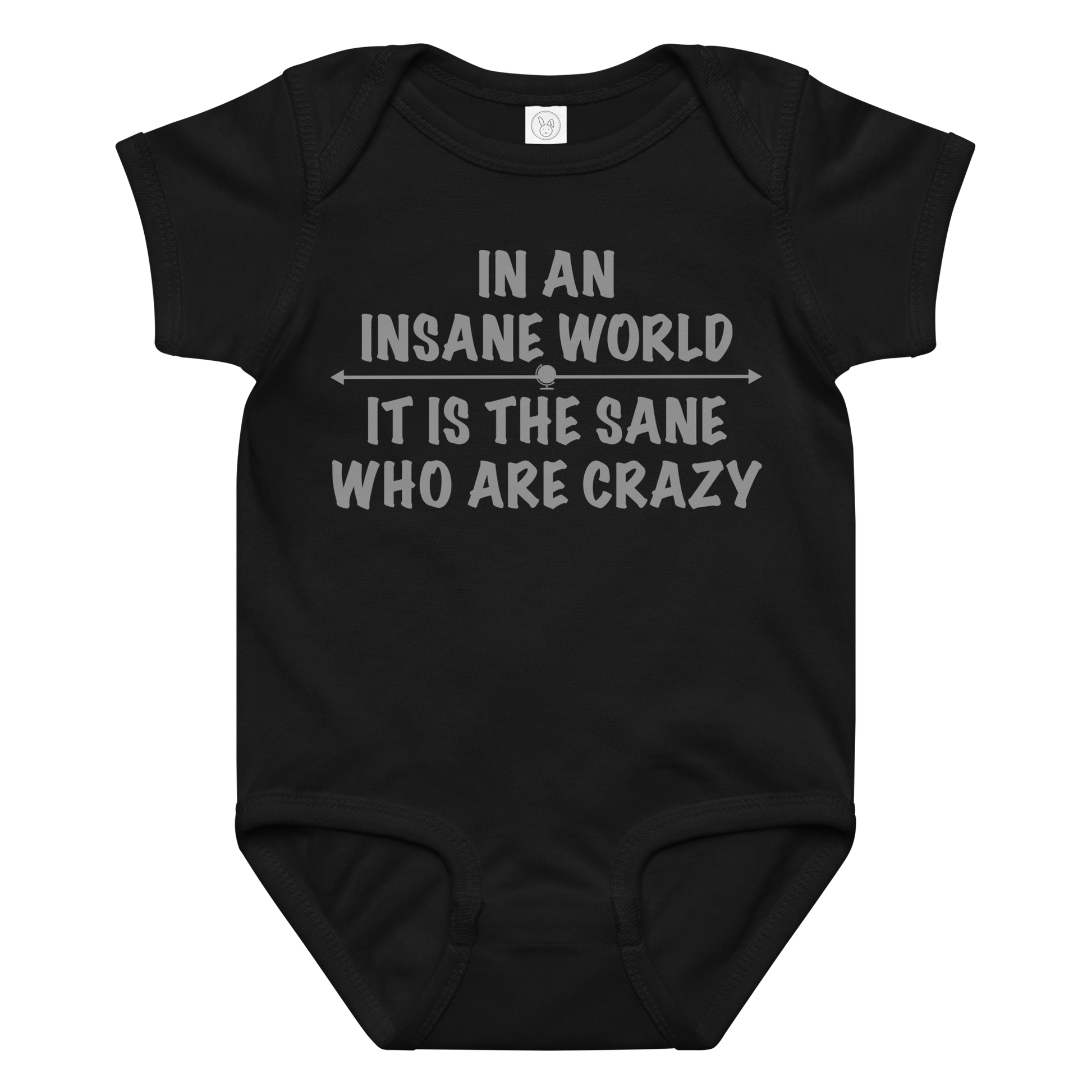 "In an insane world, it is the sane who are crazy" printed on a black baby jersey bodysuit laying on a flat surface amongst other clothes