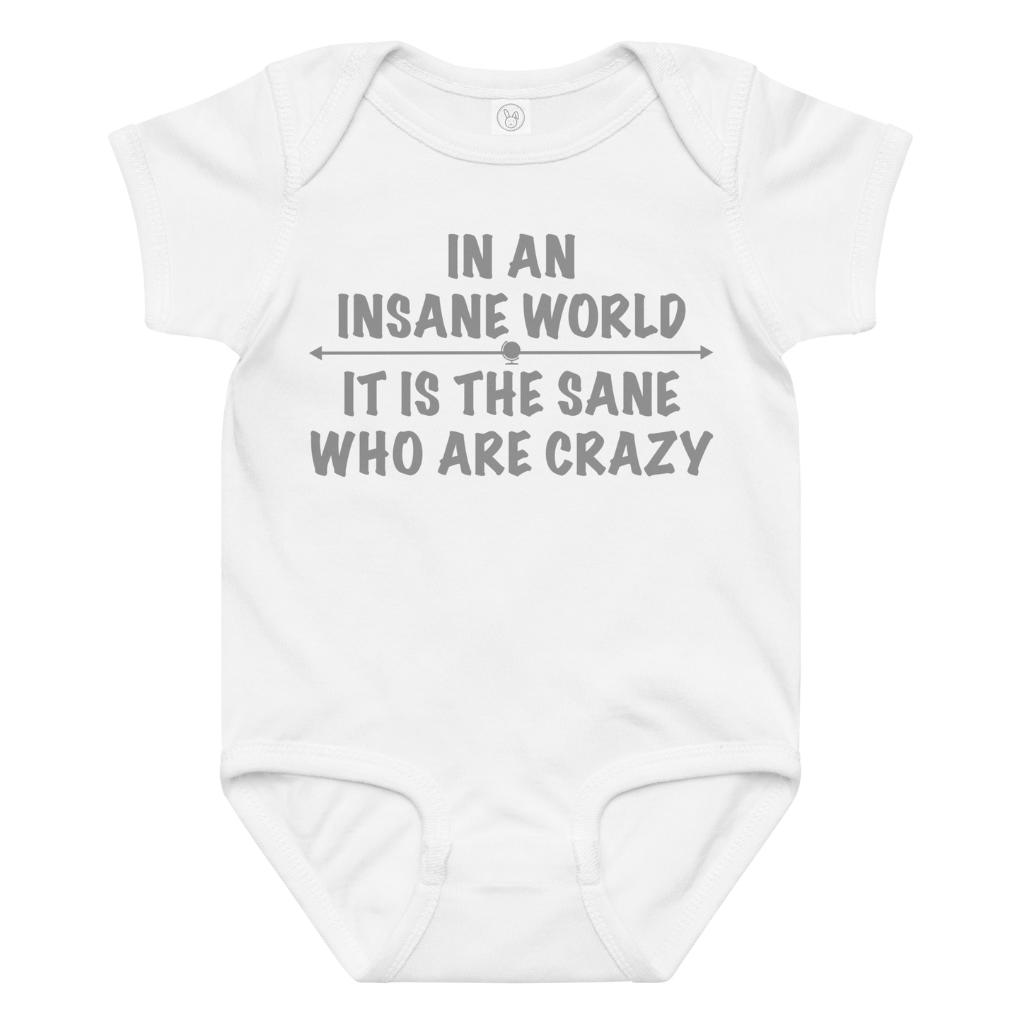 "In an insane world, it is the sane who are crazy" printed on a white baby jersey bodysuit laying on a flat surface amongst other clothes