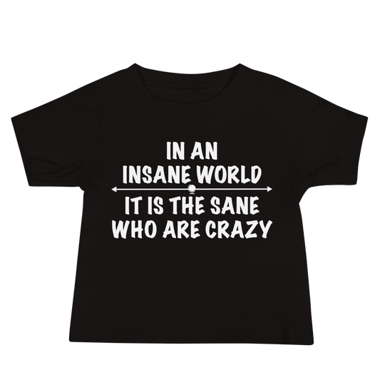 "In an insane world, it is the sane who are crazy" printed on a black baby jersey short sleeve tee laying on a flat surface