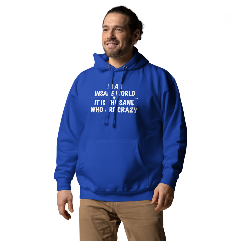 "In an insane world, it is the sane who are crazy" printed on a team royal unisex hoodie worn by a male