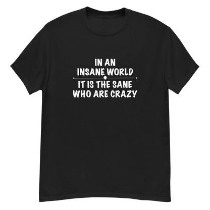 "In an insane world, it is the sane who are crazy" printed on a black unisex classic tee laying on a flat surface