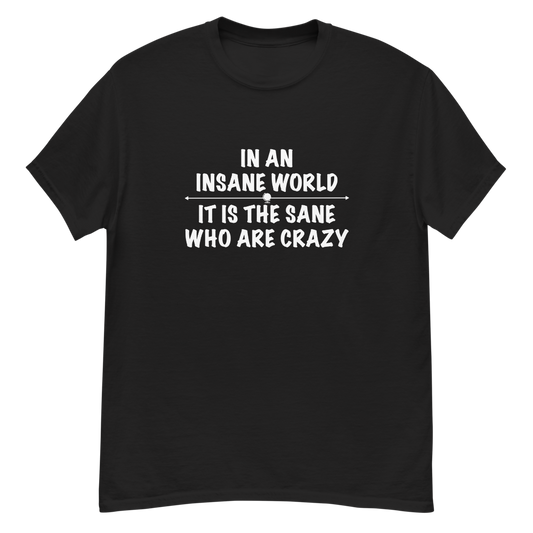 "In an insane world, it is the sane who are crazy" printed on a black unisex classic tee laying on a flat surface