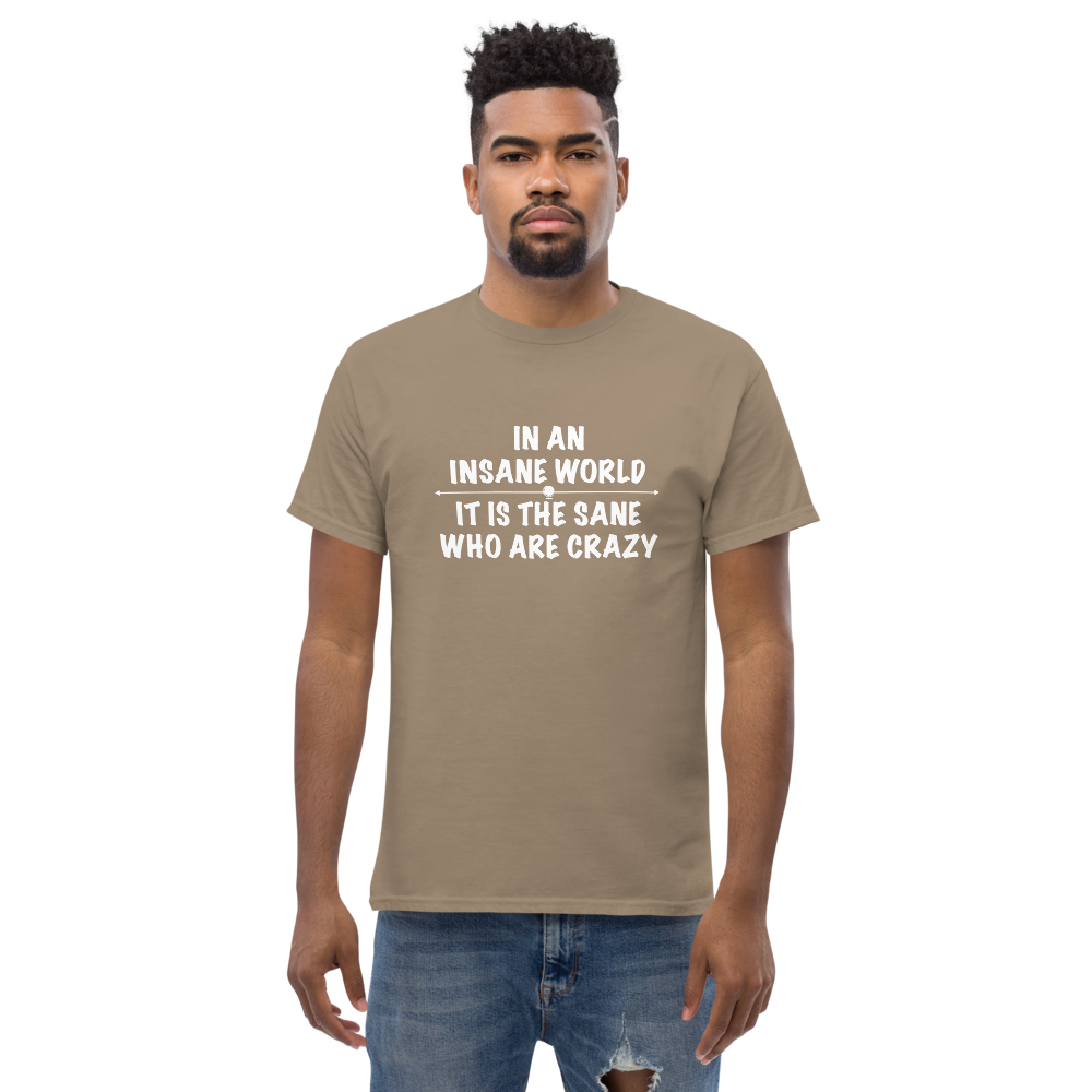 "In an insane world, it is the sane who are crazy" printed on a brown savana unisex classic tee worn by a male