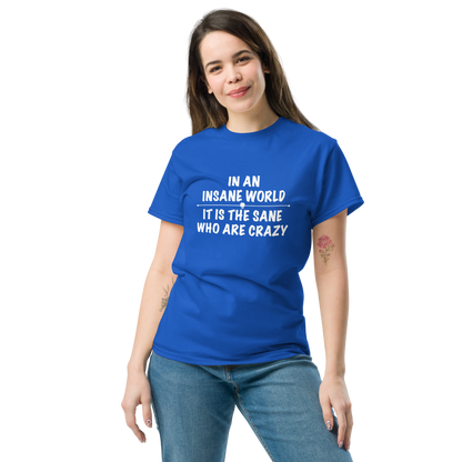 "In an insane world, it is the sane who are crazy" printed on a royal unisex classic tee worn by a female