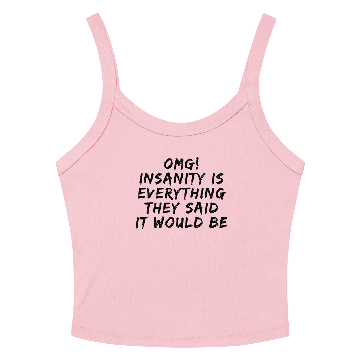 "OMG! Insanity is everything they said it would be" printed on a solid pink blend women's micro-rib tanktop laying on a flat surface amongst sunglasses and shorts