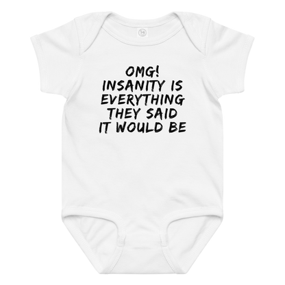 "OMG! Insanity is everything they said it would be" printed on a white baby jersey bodysuit laying on a flat surface amongst other clothes