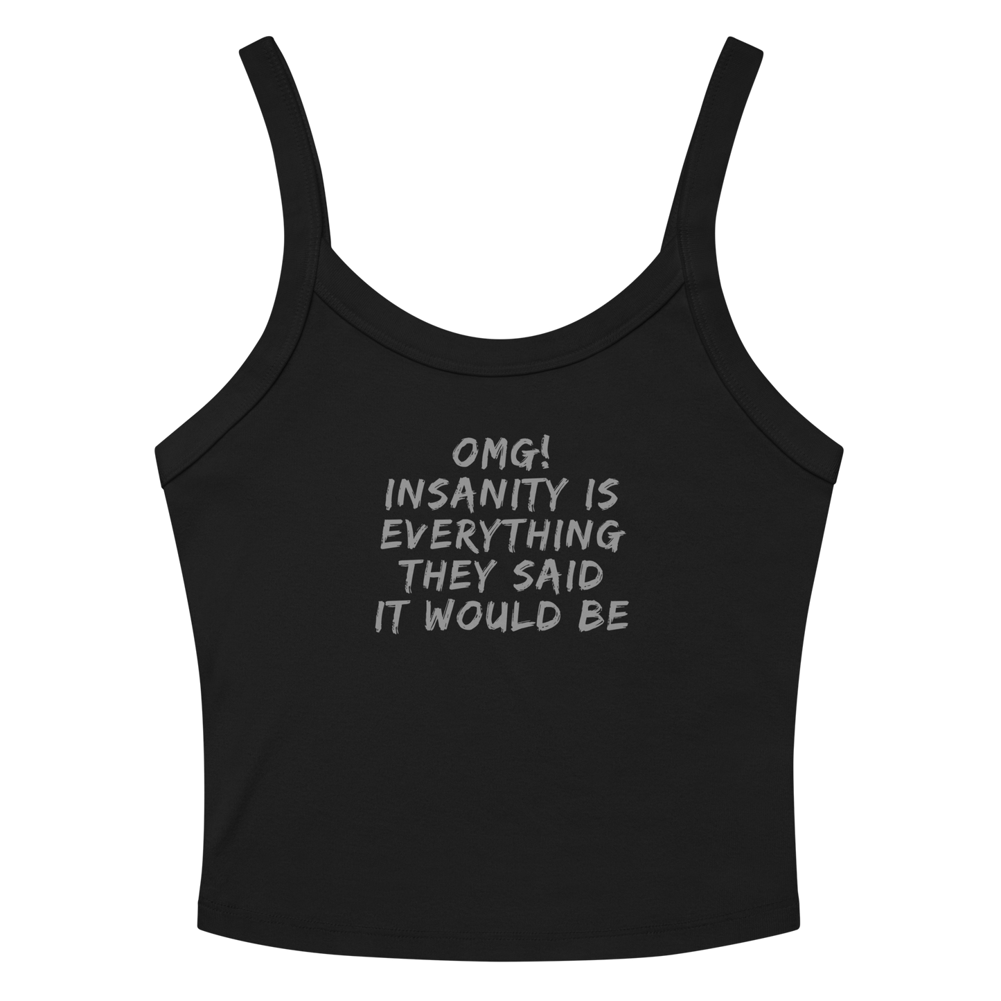 "OMG! Insanity is everything they said it would be" printed on a solid black blend women's micro-rib tanktop laying on a flat surface amongst sunglasses and shorts