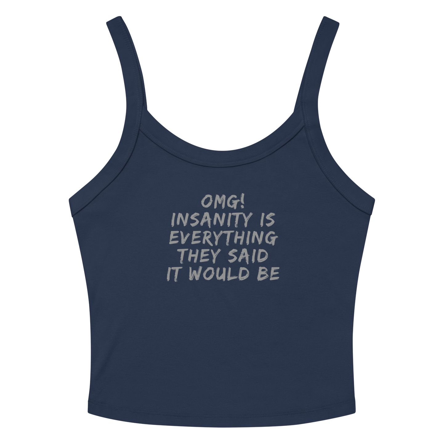 "OMG! Insanity is everything they said it would be" printed on a solid navy blend women's micro-rib tanktop laying on a flat surface amongst sunglasses and shorts