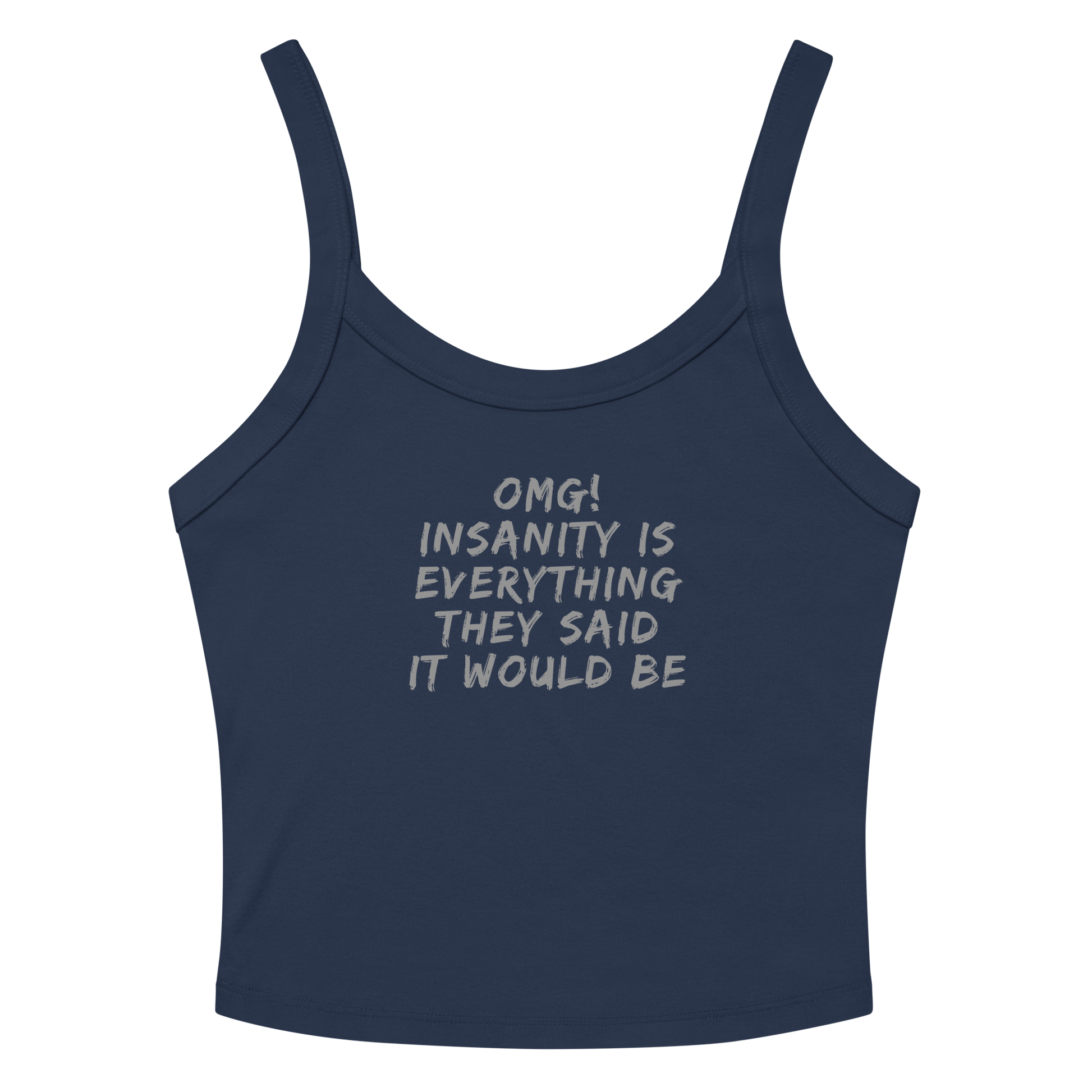 "OMG! Insanity is everything they said it would be" printed on a solid navy blend women's micro-rib tanktop laying on a flat surface amongst sunglasses and shorts