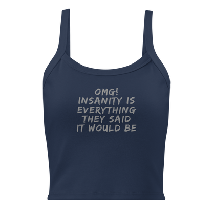 "OMG! Insanity is everything they said it would be" printed on a solid navy blend women's micro-rib tanktop laying on a flat surface
