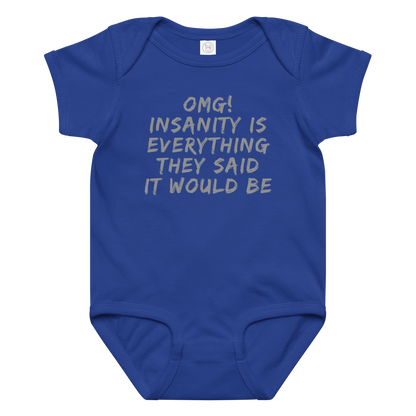 "OMG! Insanity is everything they said it would be" printed on a royal baby jersey bodysuit laying on a flat surface amongst other clothes
