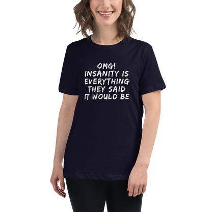 "OMG! Insanity is everything they said it would be" printed on a navy women's relaxed t-shirt worn by a female
