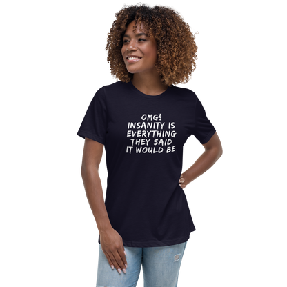"OMG! Insanity is everything they said it would be" printed on a navy women's relaxed t-shirt worn by a female