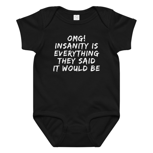 "OMG! Insanity is everything they said it would be" printed on a black baby jersey bodysuit laying on a flat surface amongst other clothes