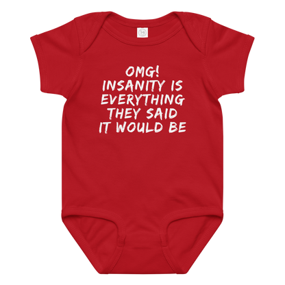 "OMG! Insanity is everything they said it would be" printed on a red baby jersey bodysuit laying on a flat surface amongst other clothes