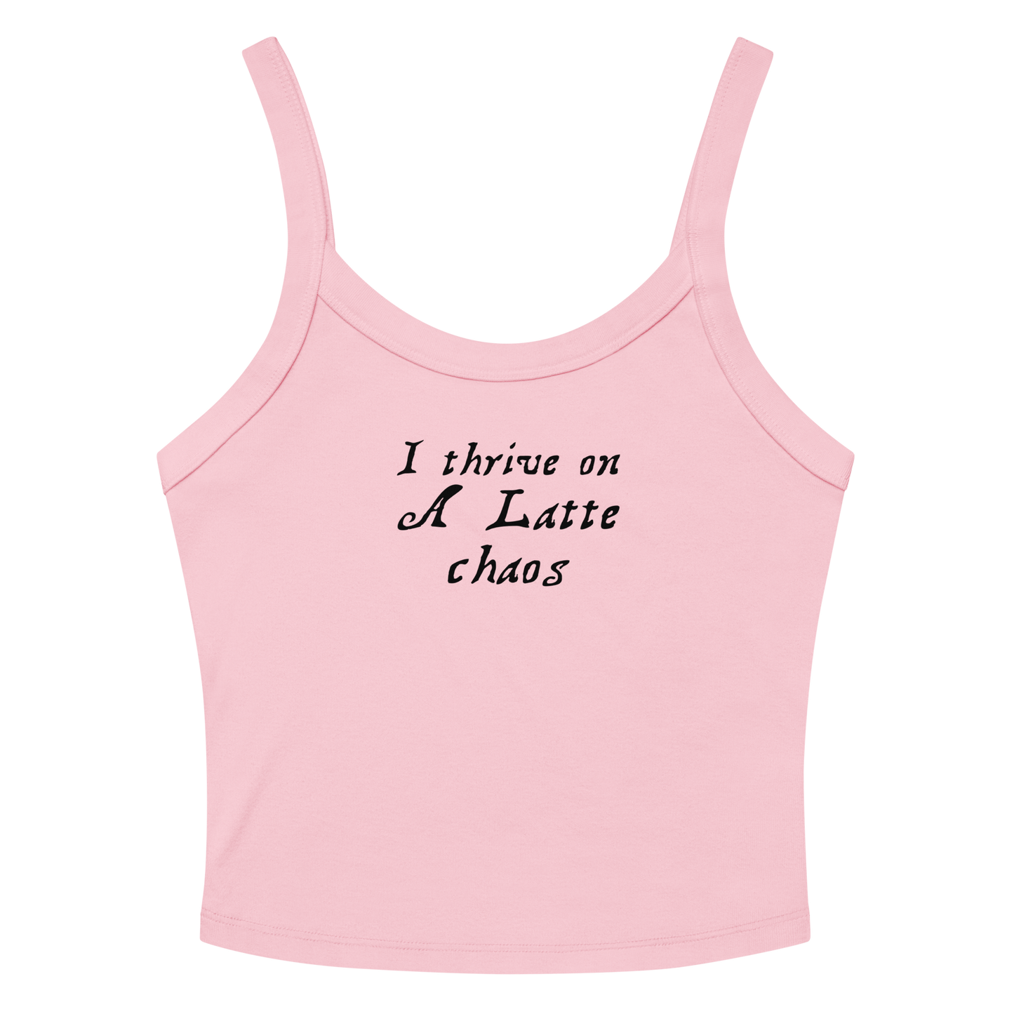 "I thrive on a latte chaos" printed on a solid pink blend women's micro-rib tanktop laying on a flat surface amongst sunglasses and shorts