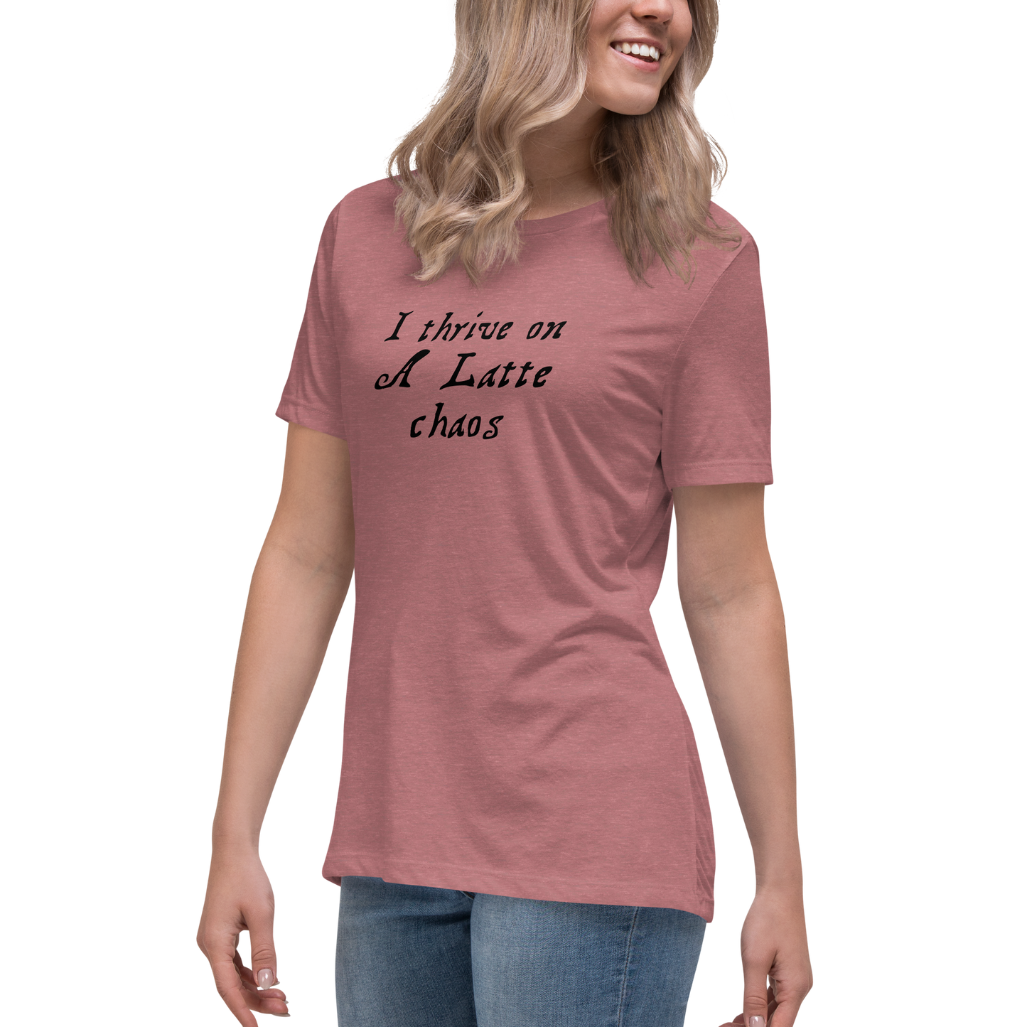"I thrive on a latte chaos" printed on a heather mauve women's relaxed t-shirt worn by a female