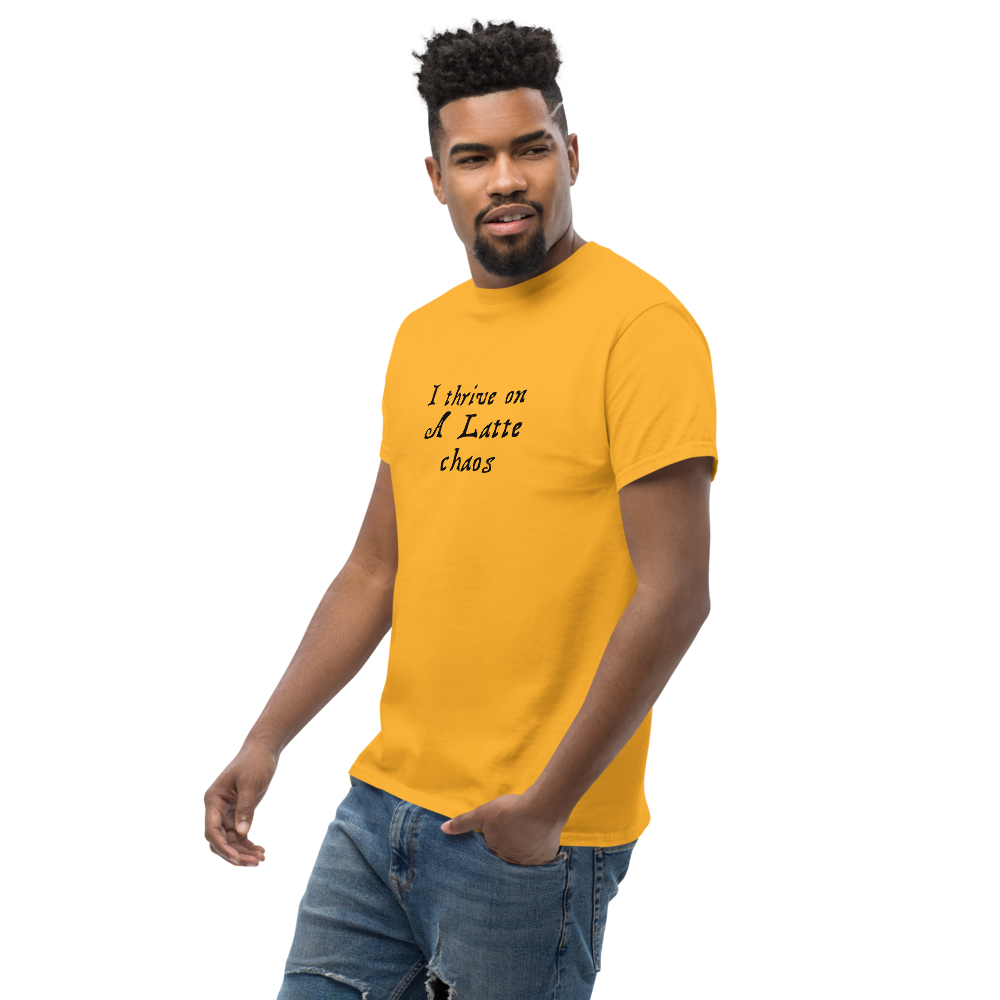 "I thrive on a latte chaos" printed on a gold unisex classic tee worn by a male