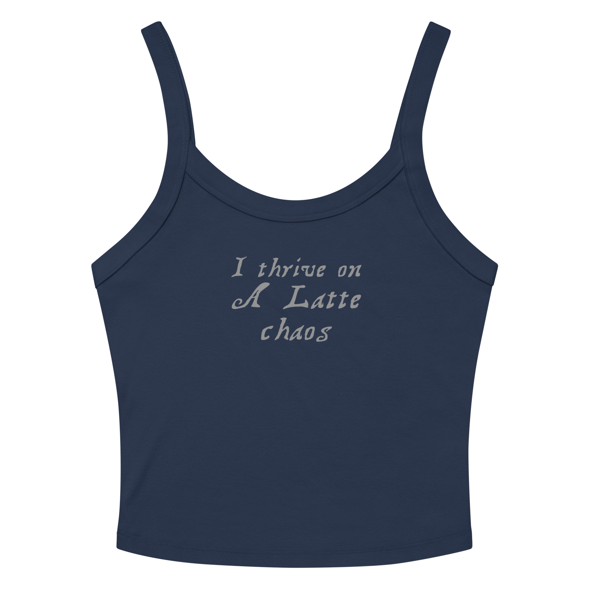 "I thrive on a latte chaos" printed on a solid navy blend women's micro-rib tanktop laying on a flat surface amongst sunglasses and shorts