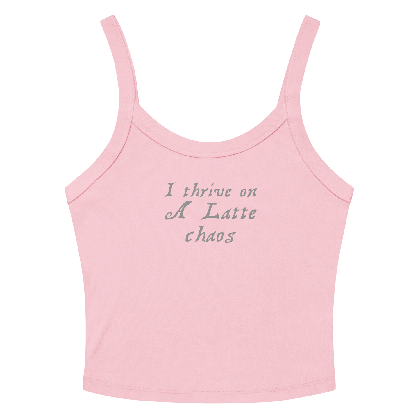 "I thrive on a latte chaos" printed on a solid pink blend women's micro-rib tanktop laying on a flat surface amongst sunglasses and shorts