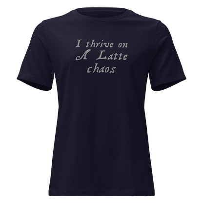 "I thrive on a latte chaos" printed on a navy on an invisible / simulated body