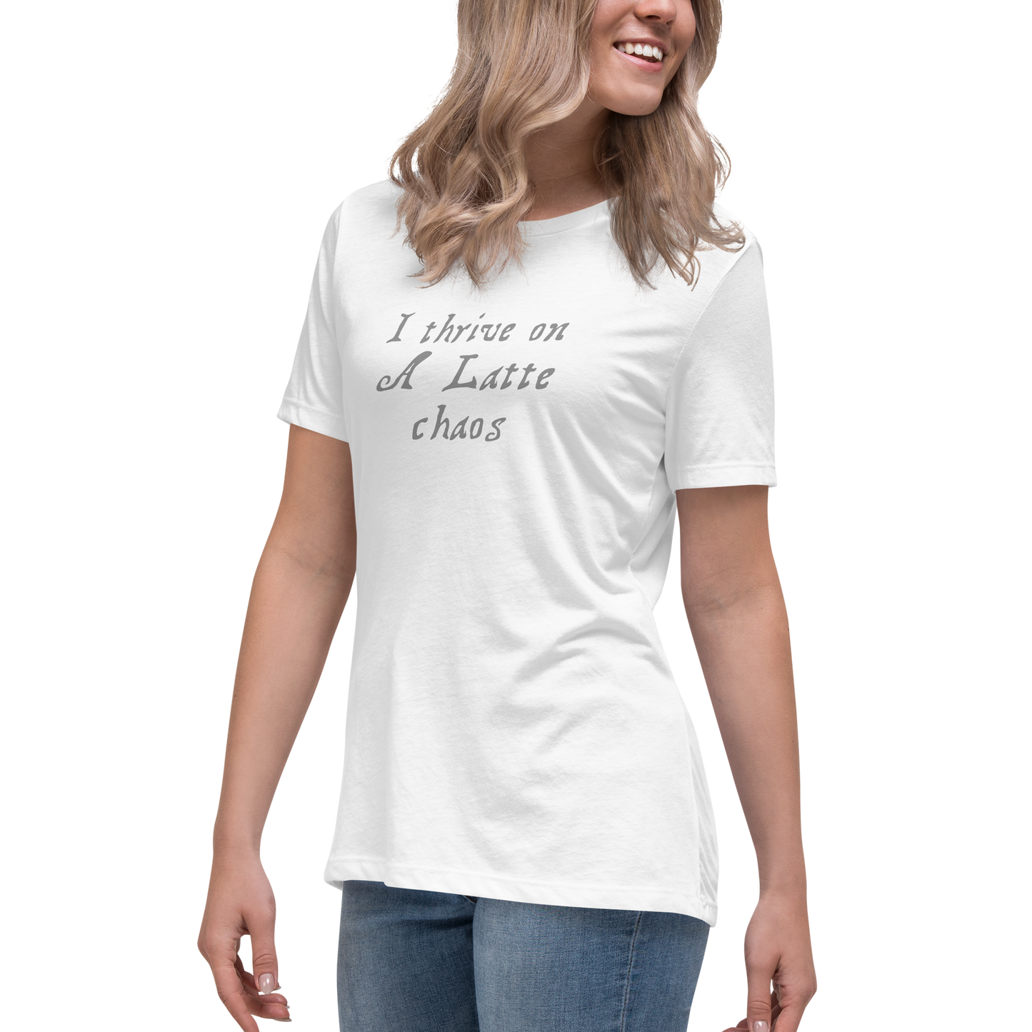 "I thrive on a latte chaos" printed on a white women's relaxed t-shirt worn by a female