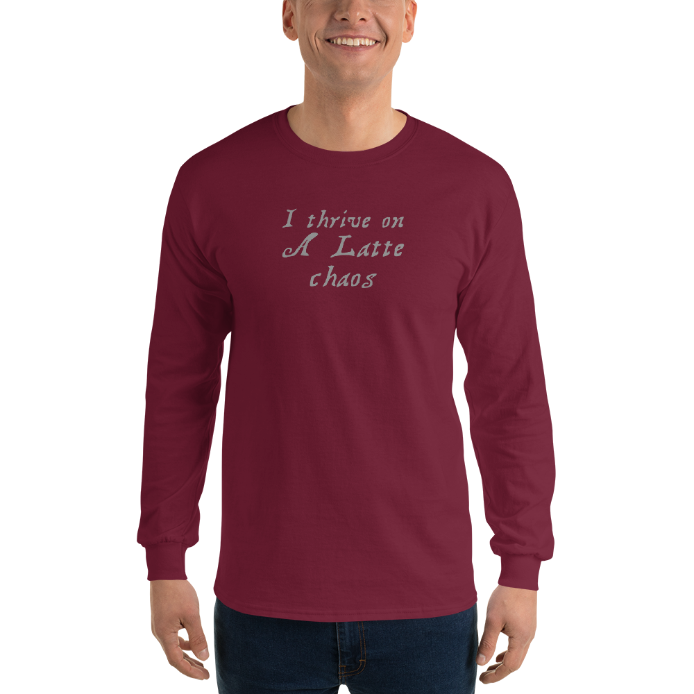 "I thrive on a latte chaos" printed on a maroon men's long sleeve shirt worn by a male
