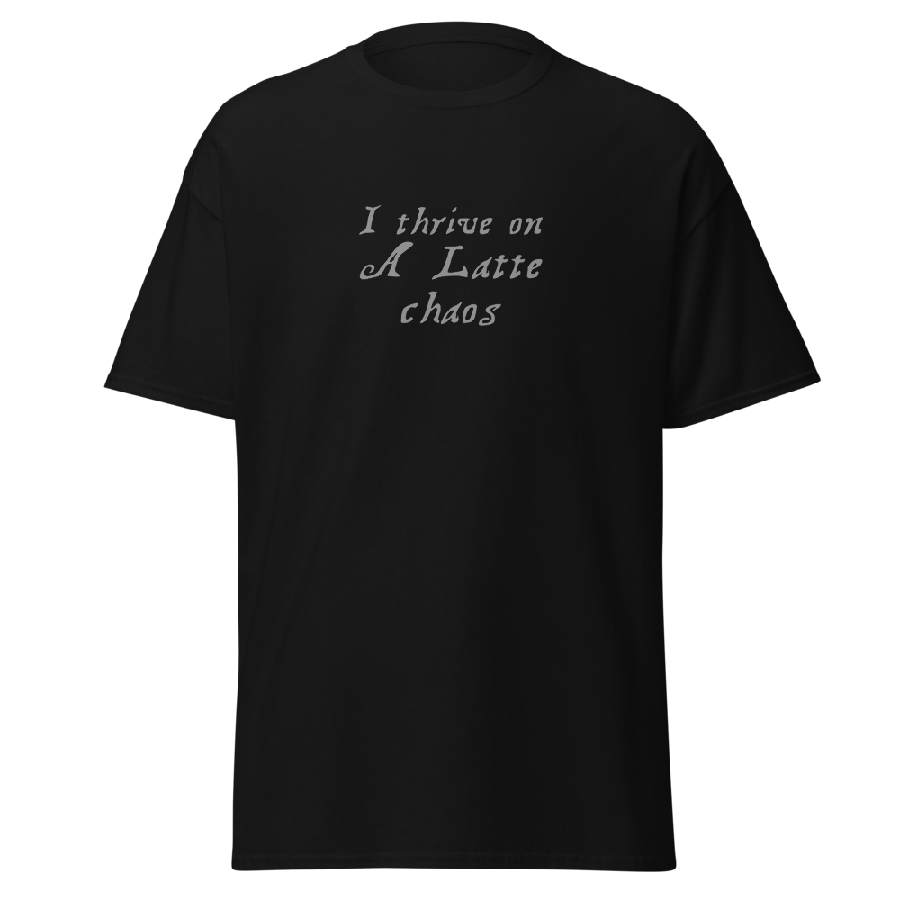 "I thrive on a latte chaos" printed on a black on an invisible body