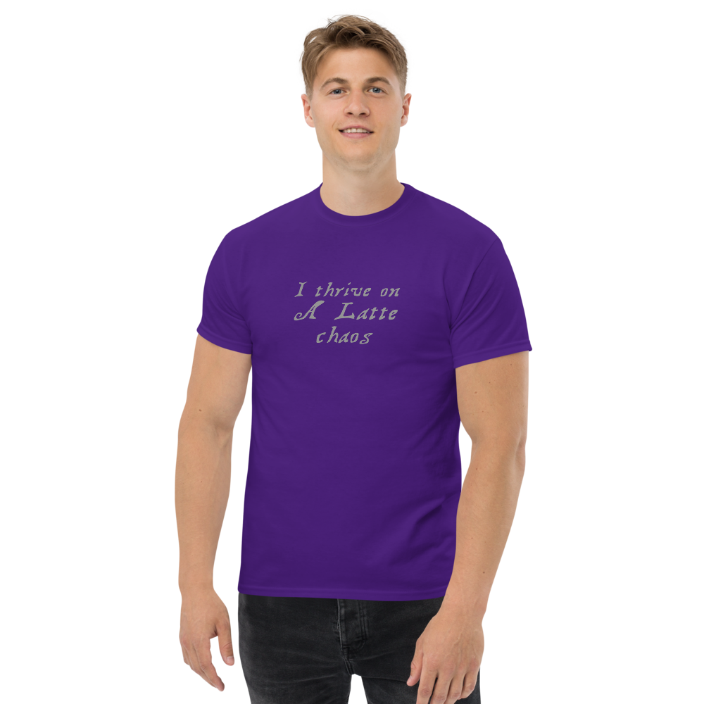 "I thrive on a latte chaos" printed on a purple unisex classic tee worn by a male