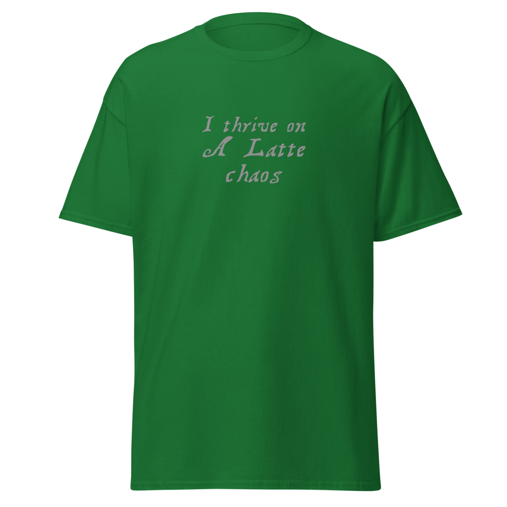 "I thrive on a latte chaos" printed on a turf green on an invisible body